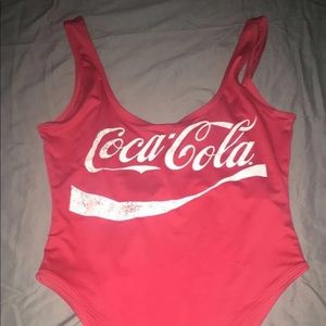 Coca Cola bodysuit size L with hat